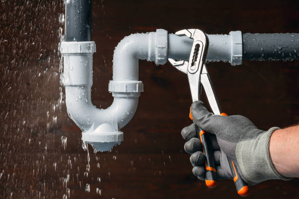 Professional Emergency Plumber technician working in Etowah, NC